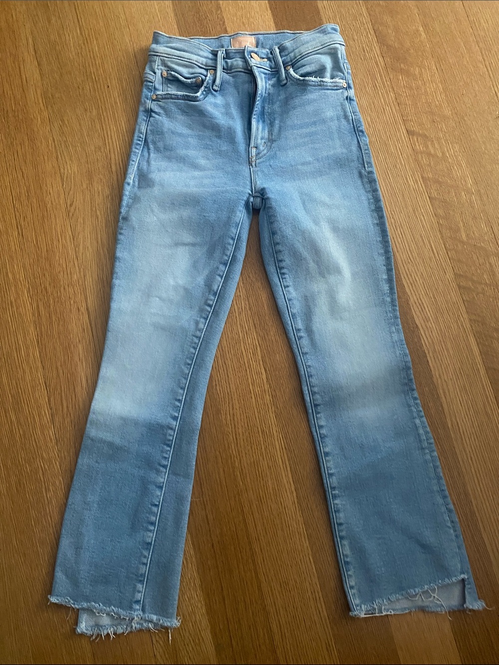MOTHER Light Blue High-Rise Flare Jeans with Frayed Hem